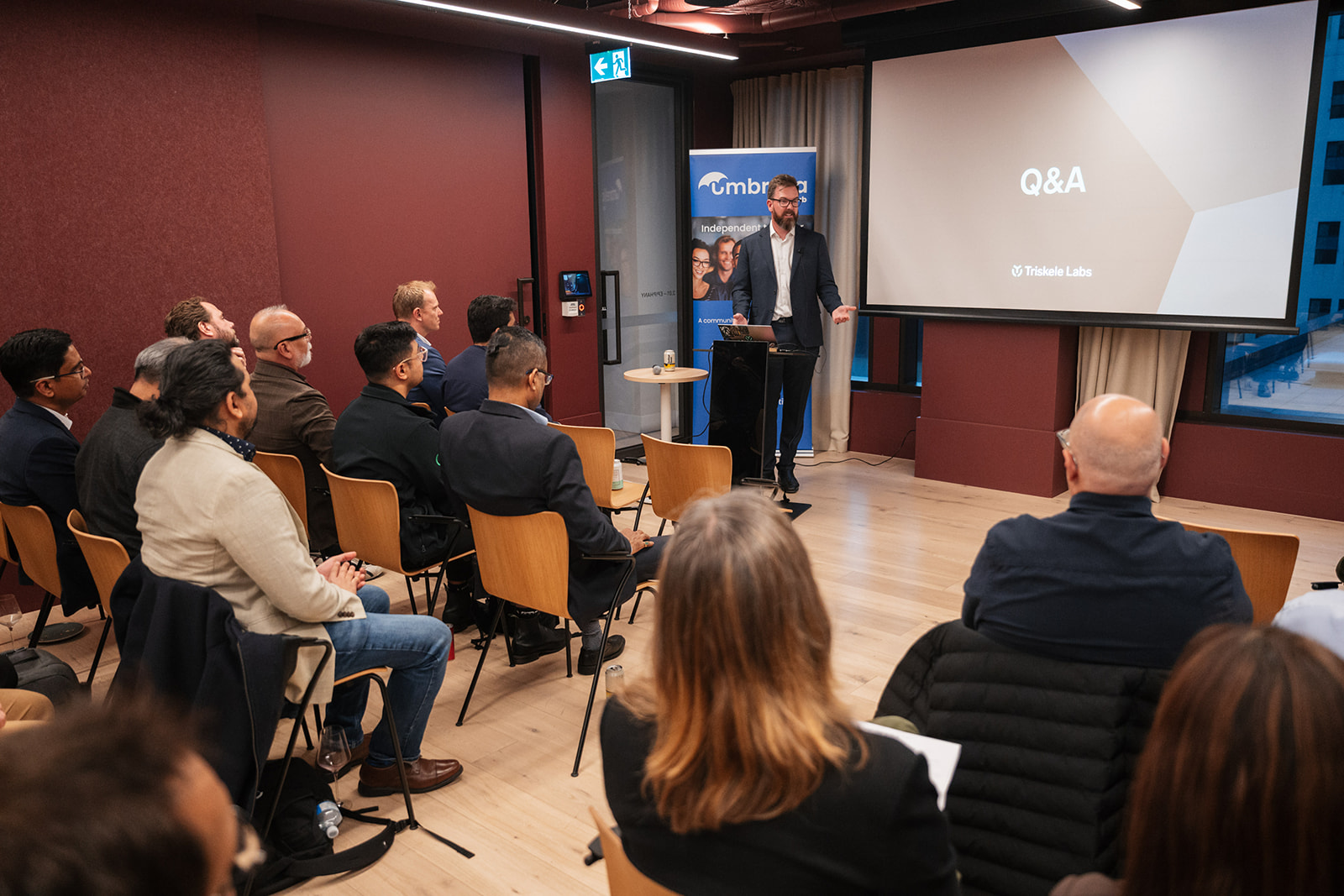 A man answering questions from audience